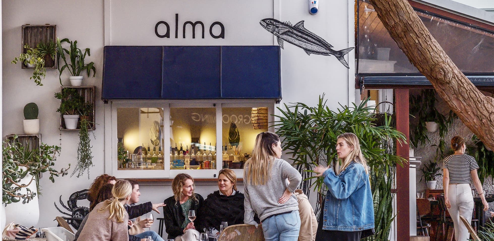 Group dining at Alma Avalon